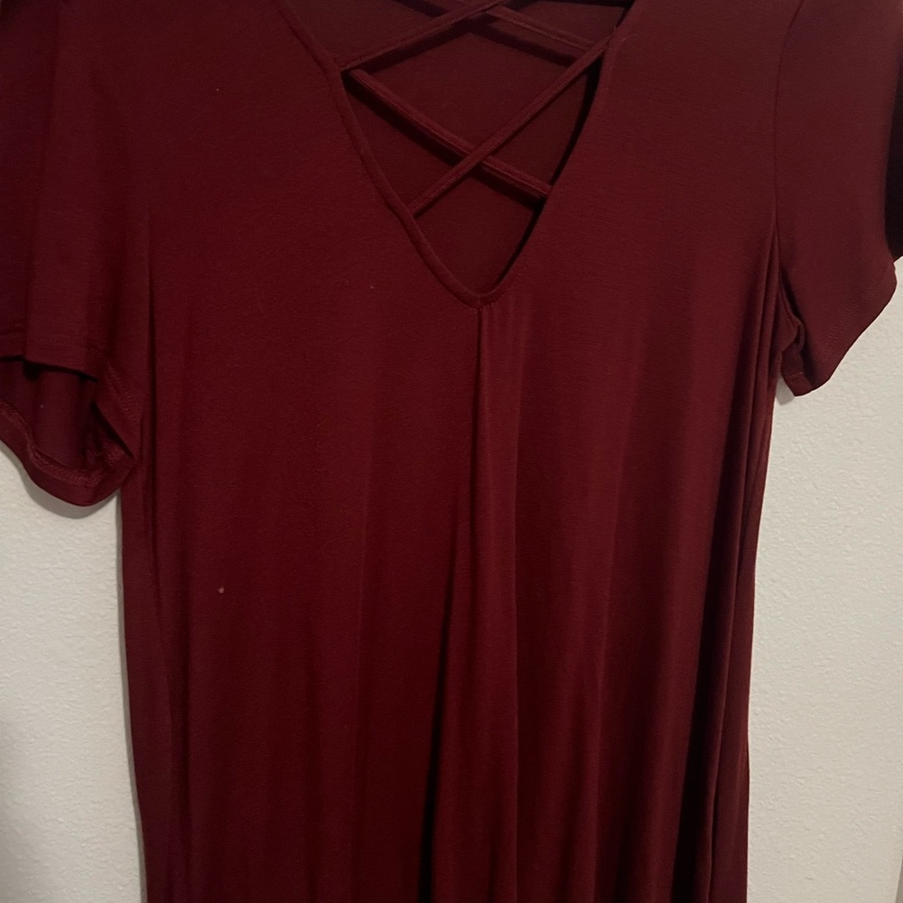 marron cross v-neck shirt